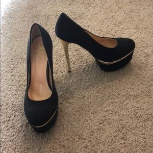Black shoes with gold trim